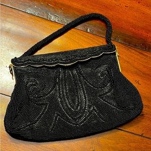 black sequined evening bag with Italian beads and black satin lining. 9x6 in.